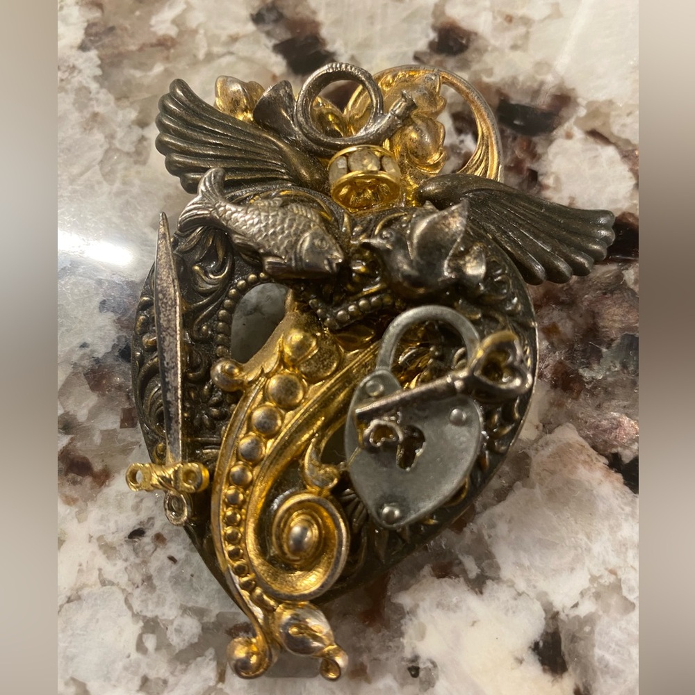 Ornate mixed-metal assemblage brooch